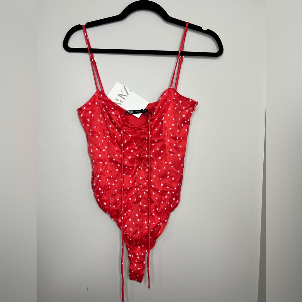ZARA one piece satin bodysuit. Red with white stars. Lace up front. NEW.